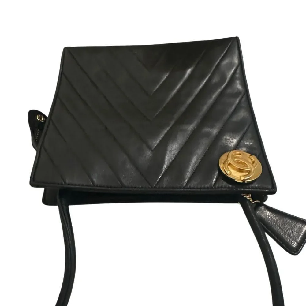 CHANEL Black Chevron Leather Shoulder Bag with Gold Accent